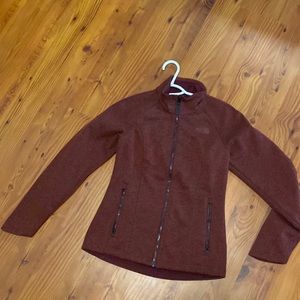 maroon north face jacket